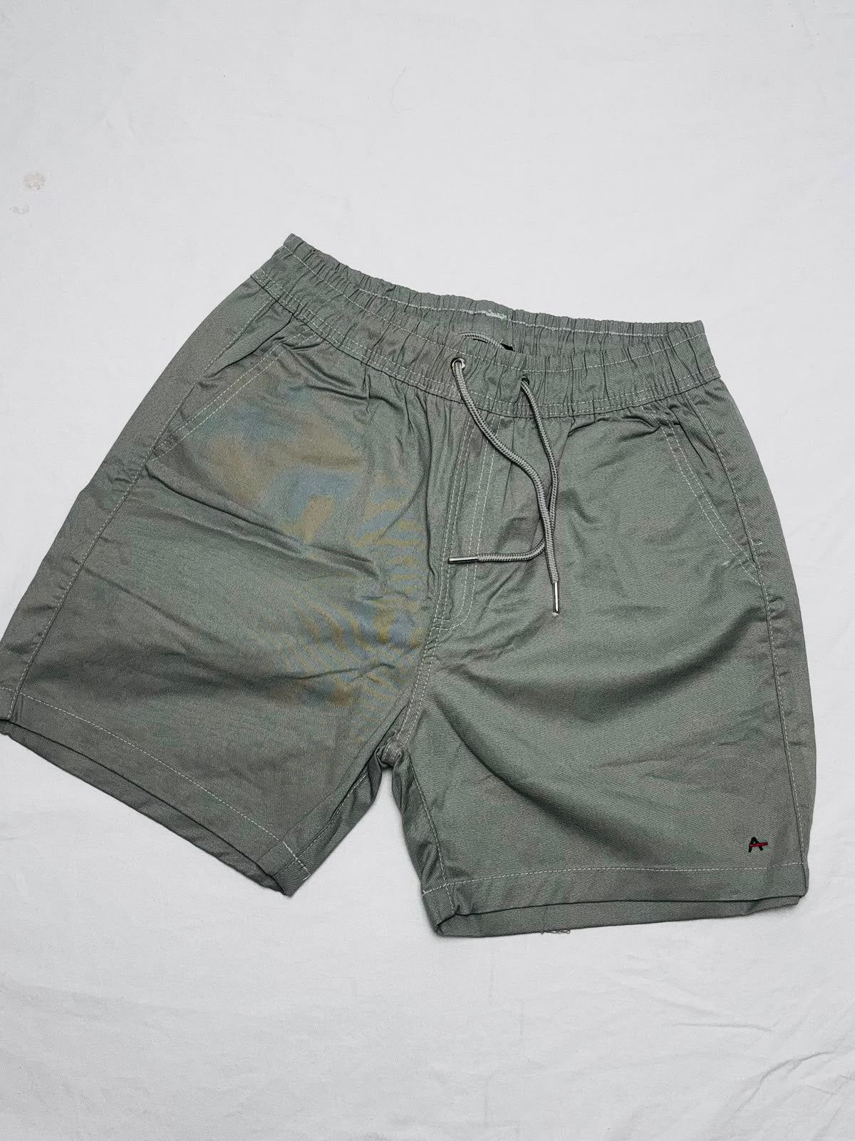 short sarja peletizada aramis cinza